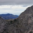 Velika planina za Kamniškim sedlom, na desni lepo vidna Šija Brane